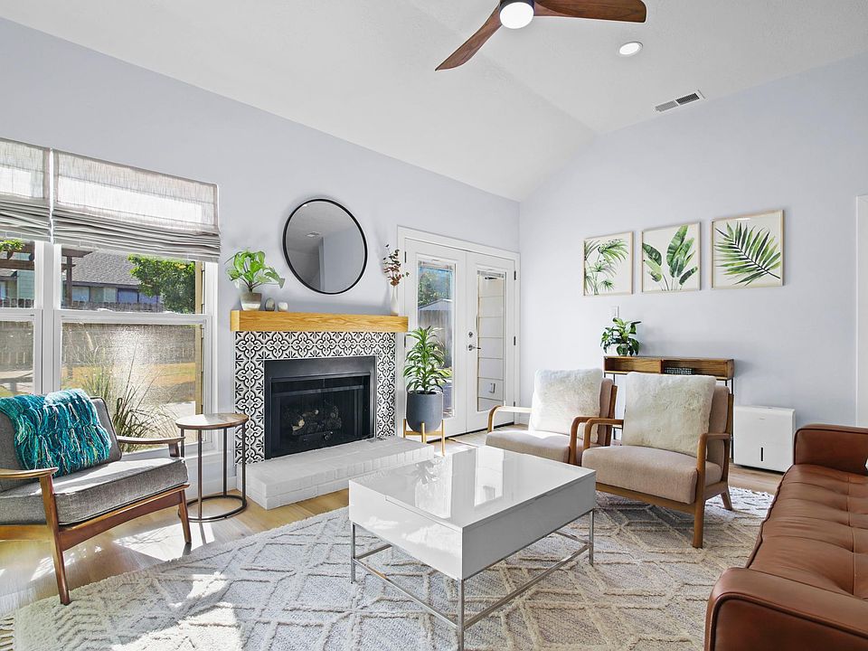 Relax in the living room which gets gorgeous afternoon sun! And cuddle up in the winter in front of the gas fireplace.