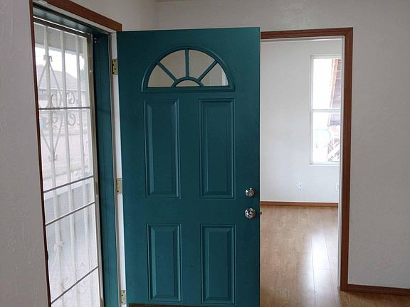 Entry hall looking into front bedroom.