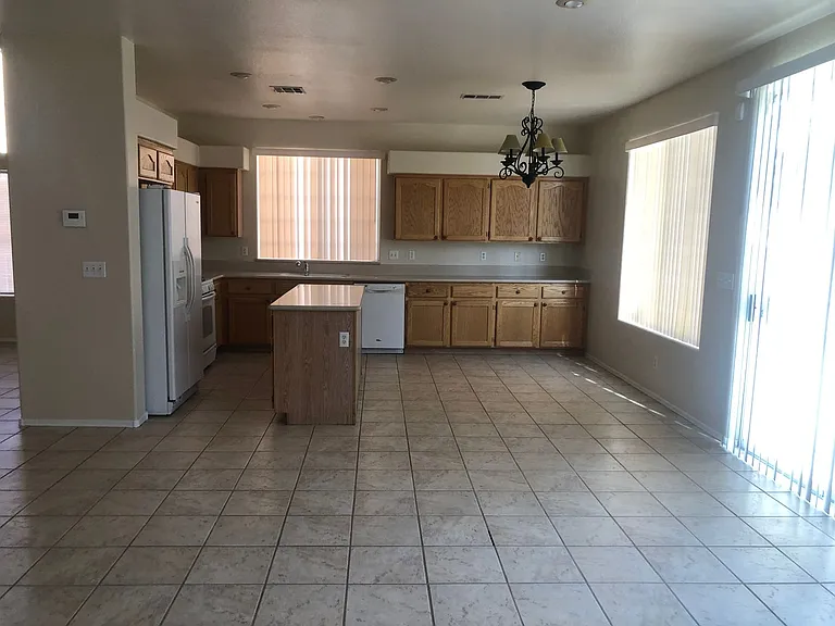 8101 Yellow Daisy Ave — Photo 11