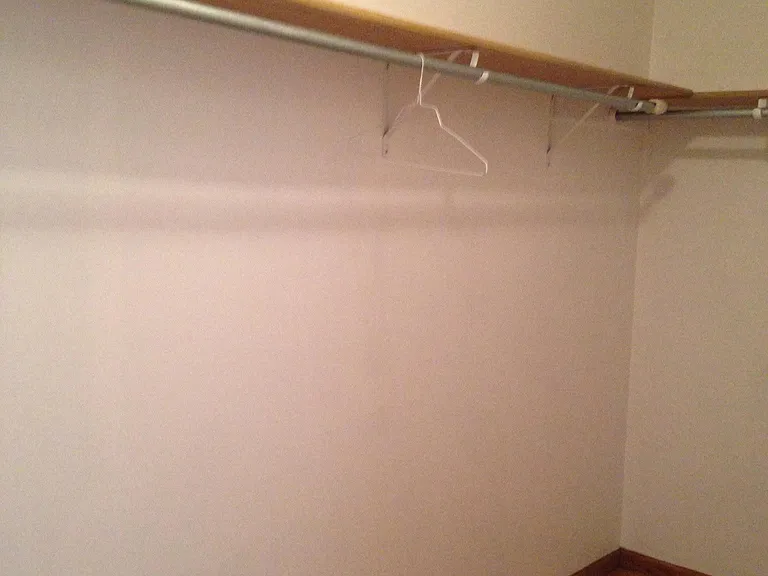 walking closet in mater bedroom