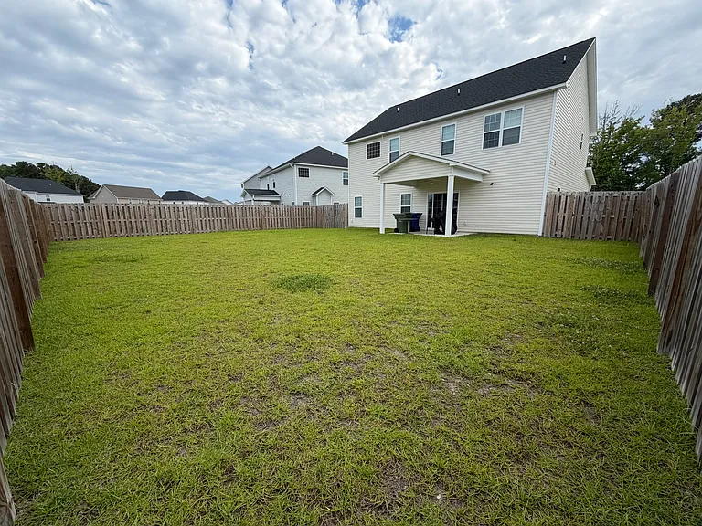Fully fenced backyard