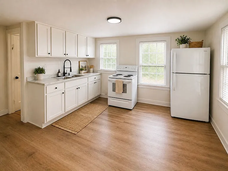 Larger kitchen footprint with room to actually use the spacenot just pass through it.