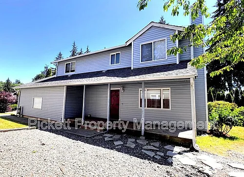 600 NE Flagstone Ln Photo 1