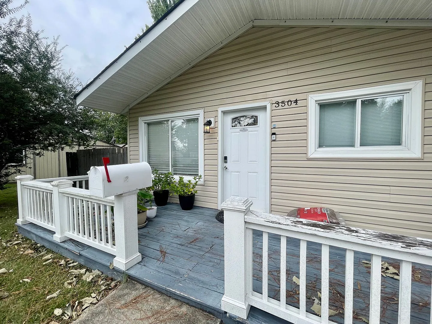 Updated 3-Bedroom Home with Sunroom, Spacious Backyard & EV Charger — Photo 3