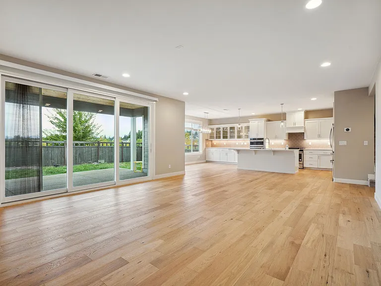 Living room with large sliding door which fully opens up