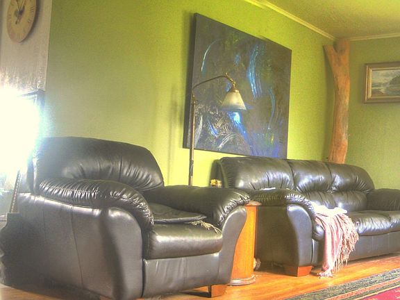 90 degree panorama of dining and living room.