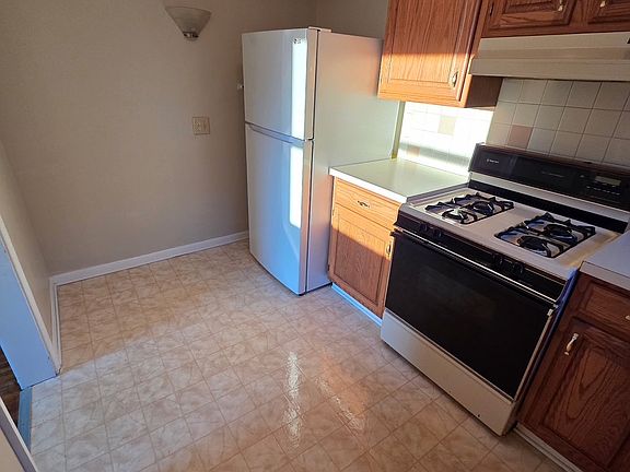 kitchen with stove and fridge