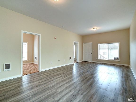As you enter the home you are greeted by a large open living space with laminate easy care flooring.