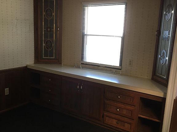 Dining area showing cabinets
