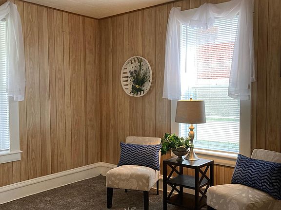 Another view of livingroom, large windows.