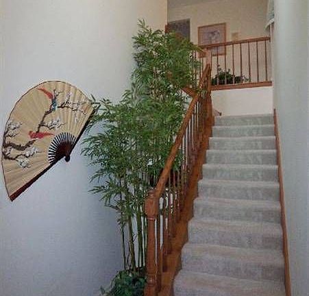 Two-story ceramic tile Foyer with access to attached garage.