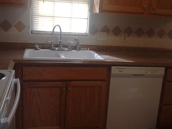 Kitchen sink side.