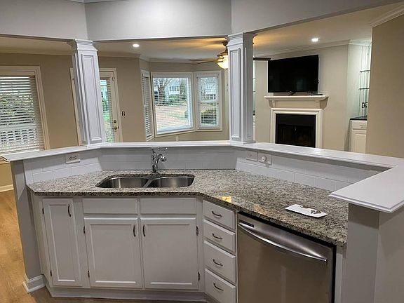 The kitchen overlooking the LR with views to the lake