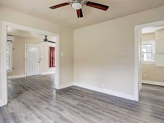View of the living, dining and the kitchen area.