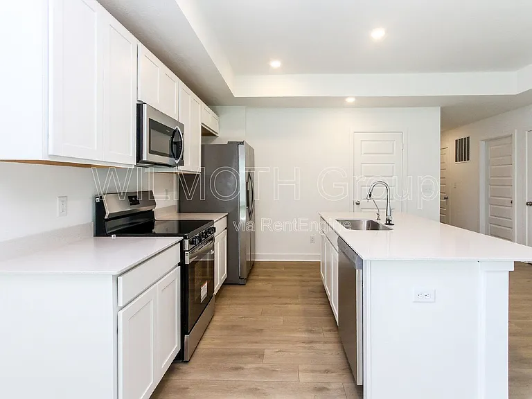 8831 Georgina St — Photo 4