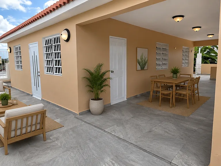 Digitally staged version of the front and side patio for entertaining and dining al fresco. Create your own outdoor eatery in the comfort of your own home or use the space to your heart's content.