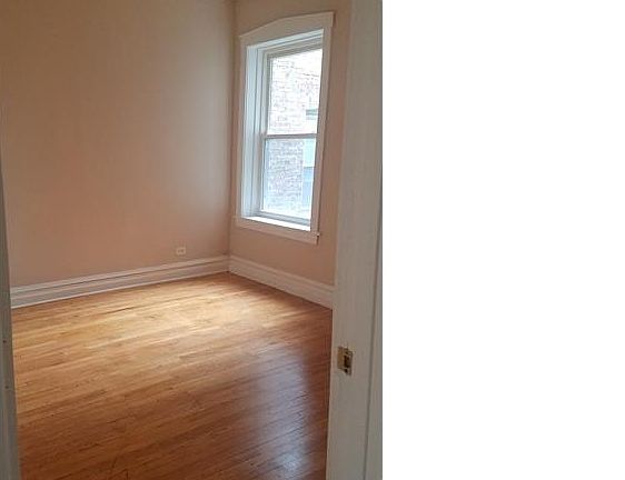 4th image of 11033 S Vernon Ave