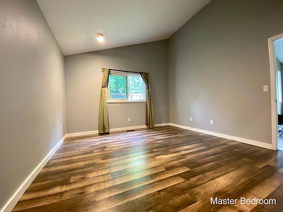 Bedroom #1 is large master bedroom. New windows 2019.