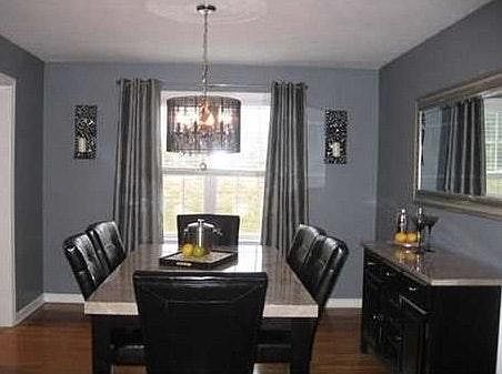 Hardwood floors, connected to the Kitchen.