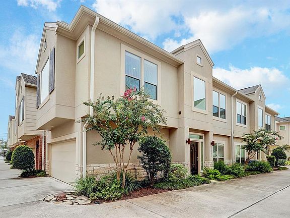 Beautiful stone and stucco front elevation with garage entry on the side of the home! One of the few in the community with this floor plan!