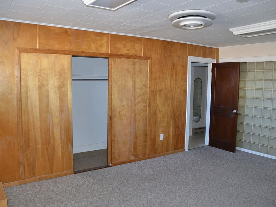 main Living Area looking towards closet and bathroom door
