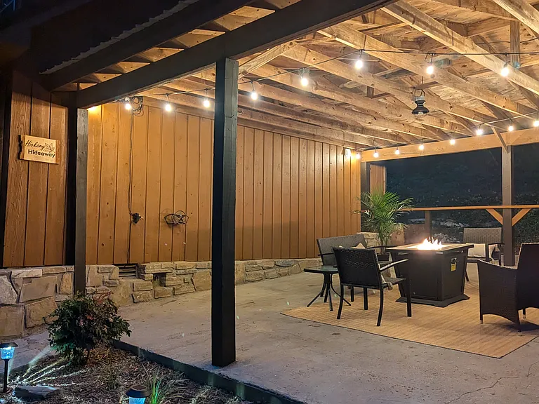Outdoor Covered Patio Space with 6 Seats, Cocktail Rail and Firepit Table