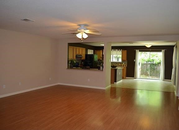 Wonderful family room is open to the kitchen and breakfast area.  Tons of windows for natural light.  No carpet!