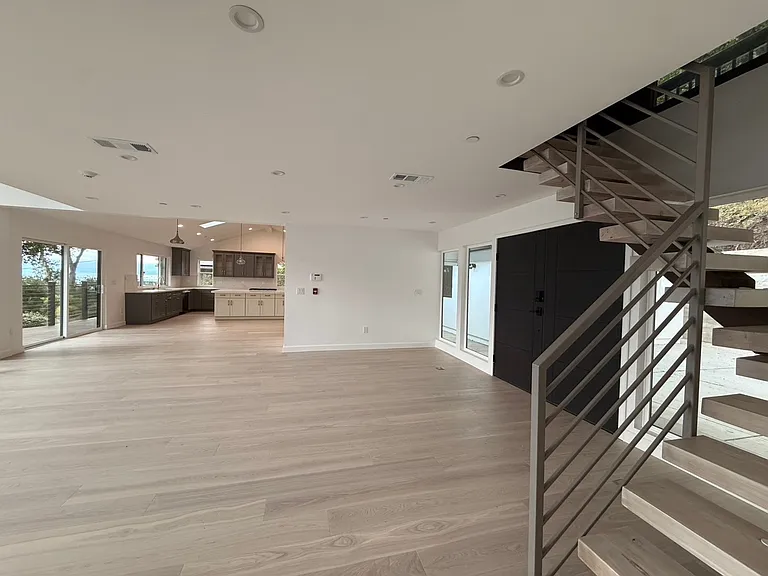 Living Room/ Kitchen/ Front Door/ Staircase