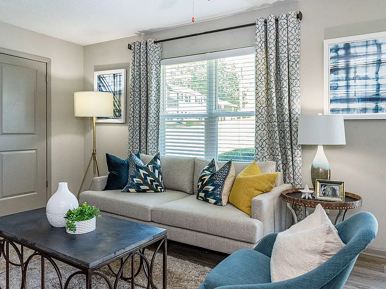 Spacious living room with hardwood-style flooring