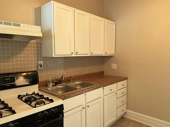 Big, clean, bright kitchen with lovely remodeled counters and cabinets with heaps of storage and surface space!