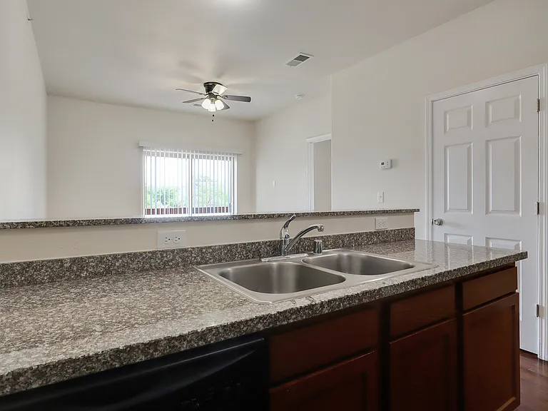 Unit 310 Kitchen looks out to the balcony