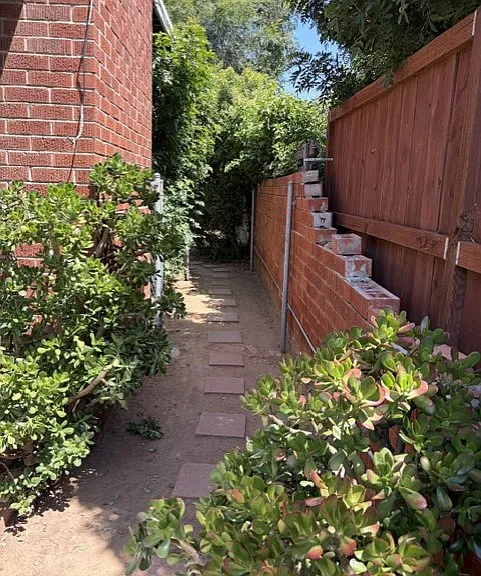 walkway to and from backyard to side yard