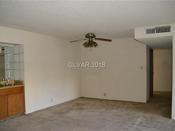 Open living space with the dining area just steps from the living room and kitchen.