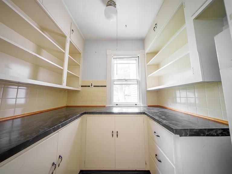 Bonus pantry for additional food storage and organization of all of your small kitchen appliances.