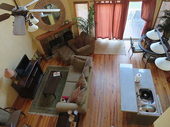 Greatroom
						:
						A view from above...beautiful hardwoods, fireplace, and view