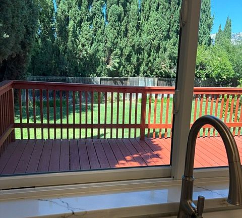 View from kitchen sink window to backyard