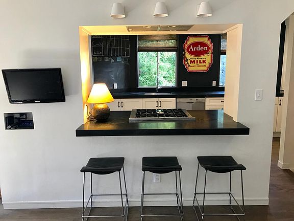 Eating bar open to kitchen