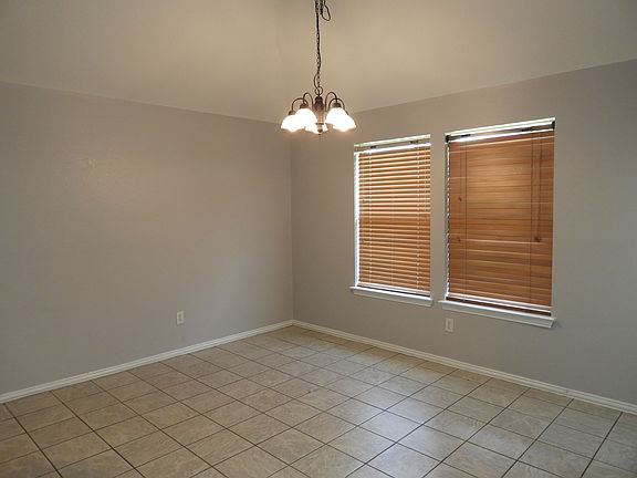 Eating area with view to backyard.