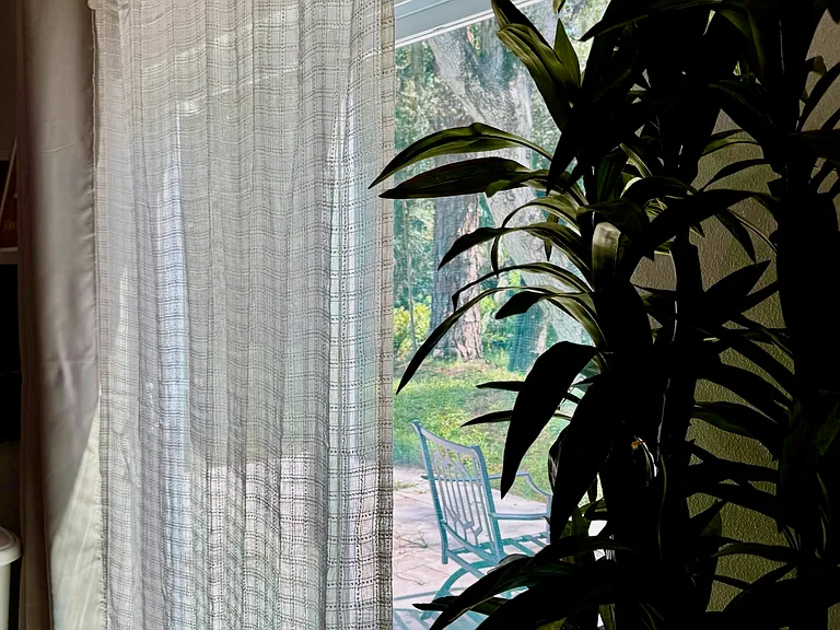 Large sliding doors to private furnished marble patio!