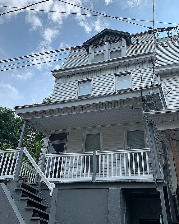 Door at street level provides direct access to basement or kitchen