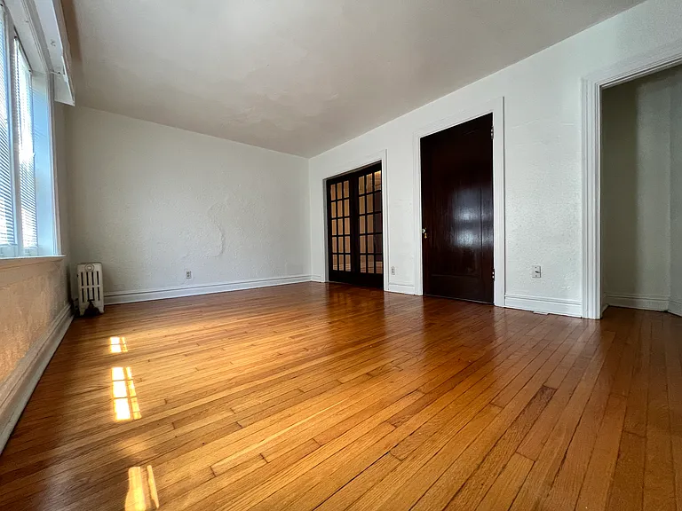 Entering from the building's inner stairwell, into the first main room, you will find windows flooded with Eastern light and multiple closets with ample storage space.
