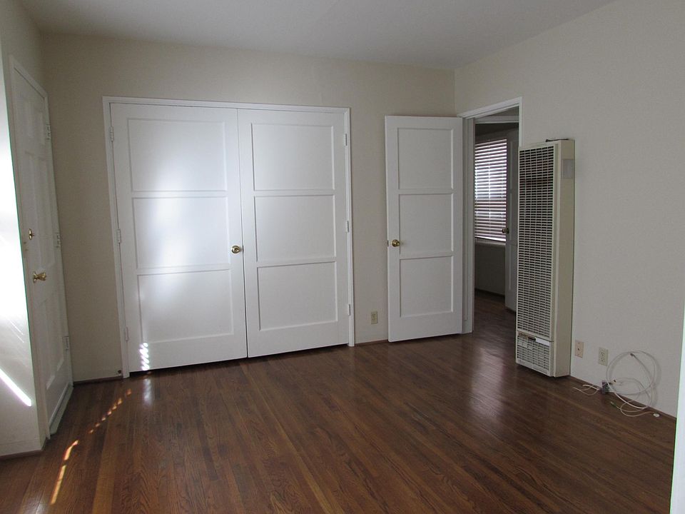 Living Room with Large Spacious Storage Closet