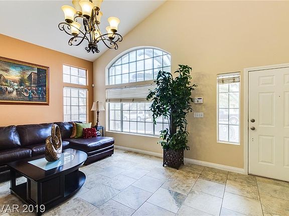 4th image of 8716 Blooming Sand Ave