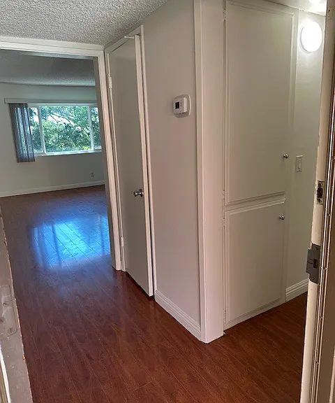 Entry with coat closet and linen closet