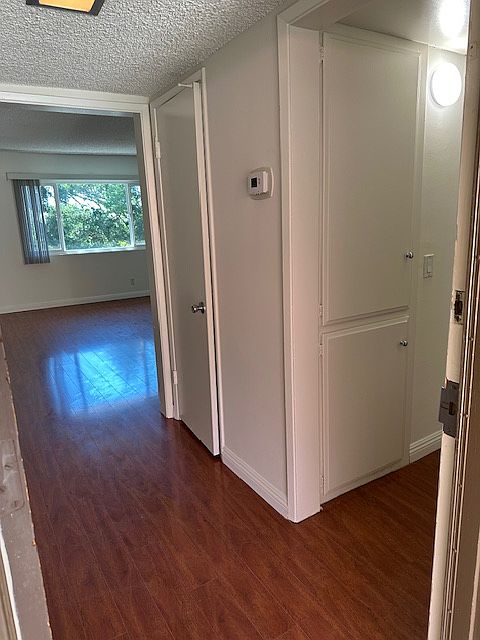 Entry with coat closet and linen closet