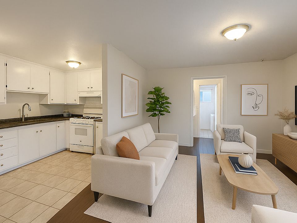 AI generated. Entrance to living area, new countertops, sink/faucet in kitchen. Hardwood floors.