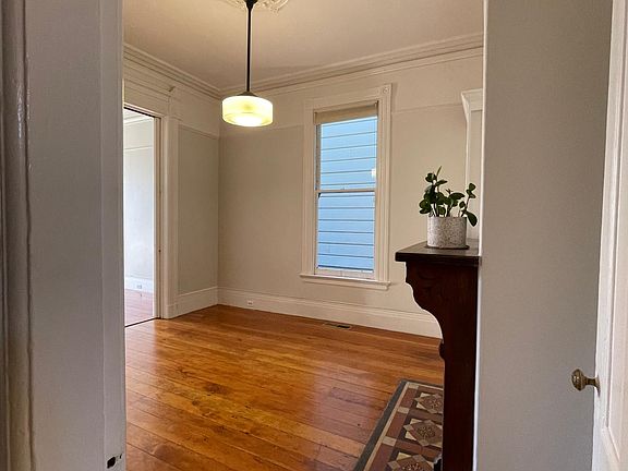 Bedroom or office space that opens to living room with sliding double doors