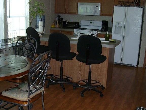 Kitchen with Breakfast Bar & Dining Area