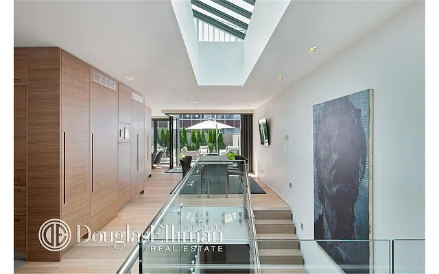 Sold by Douglas Elliman | media 9