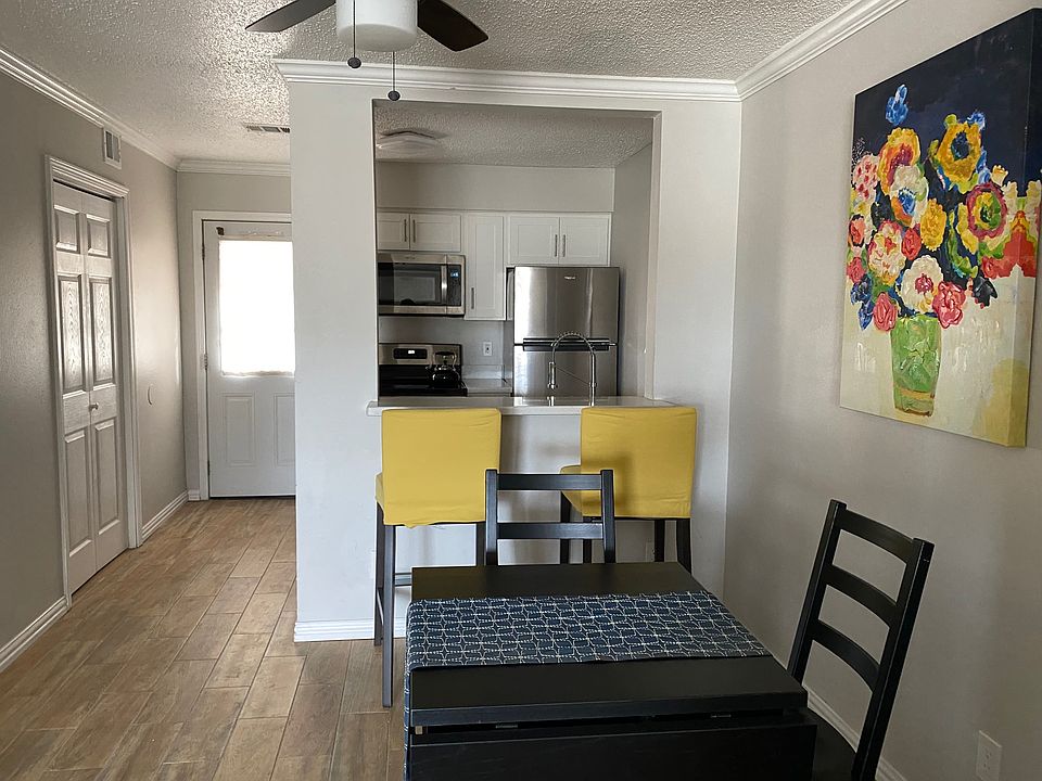 Dining area and kitchen (staged)